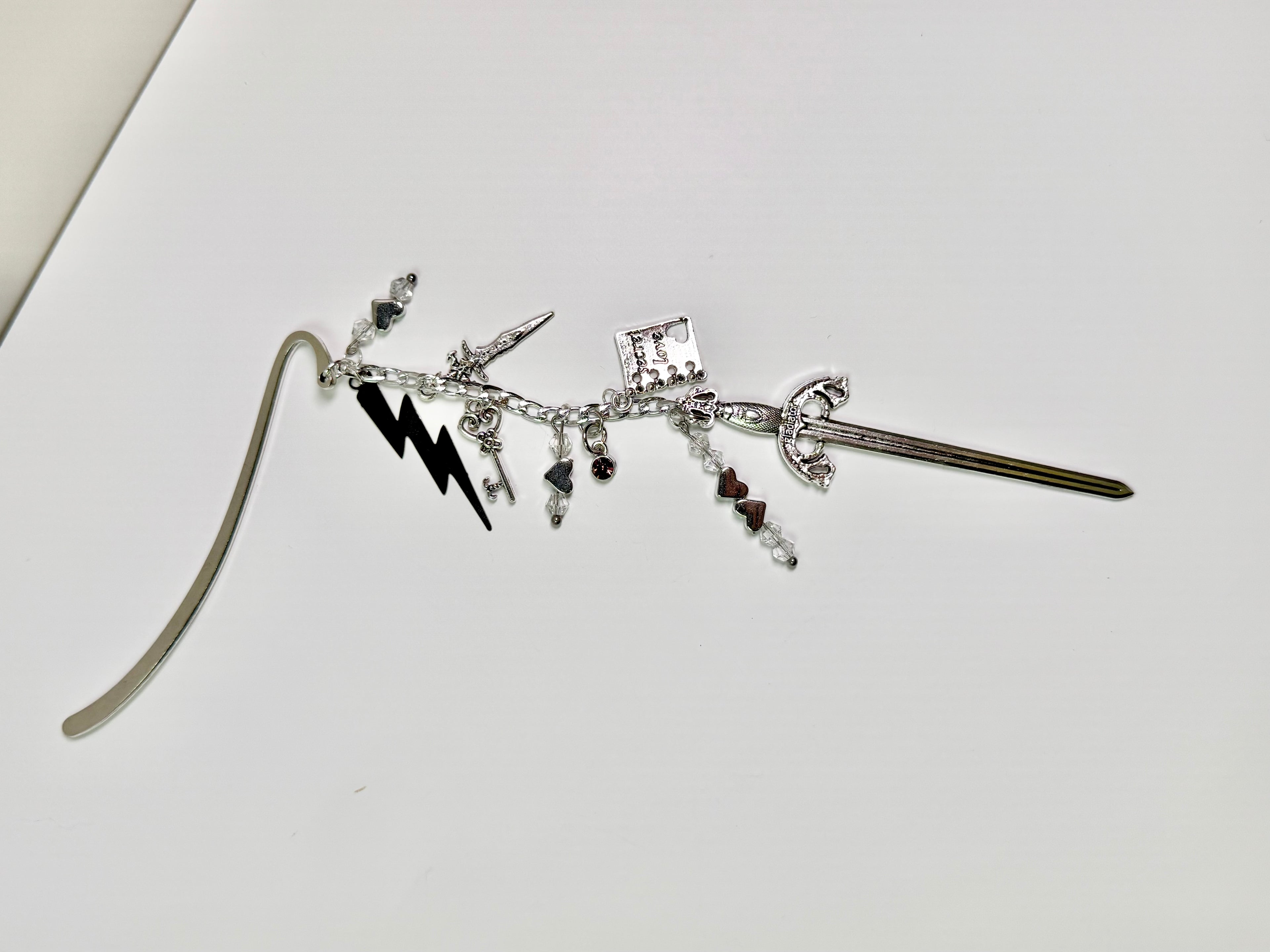 stormforged bookmark charm