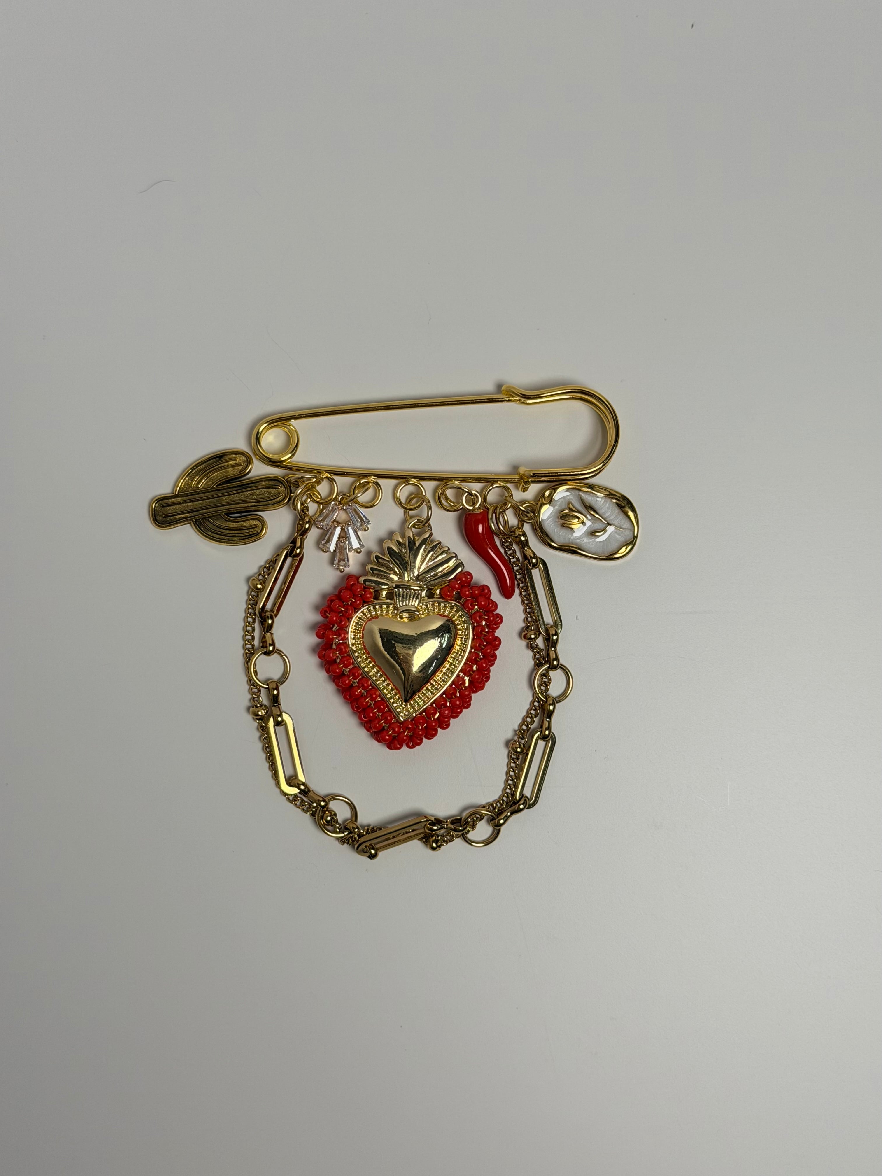 fuego sagrado charm pin