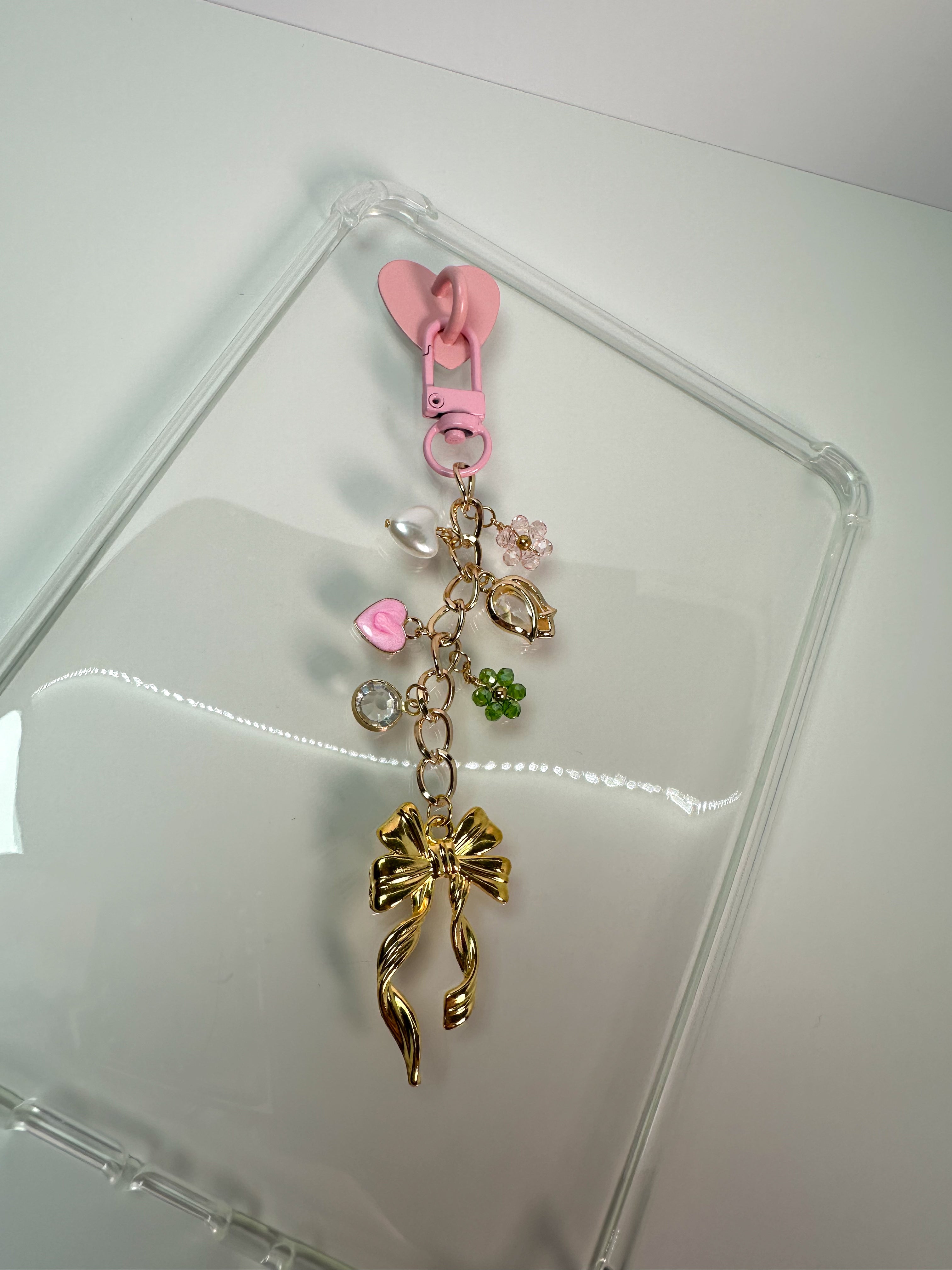 golden ribbon glow charm